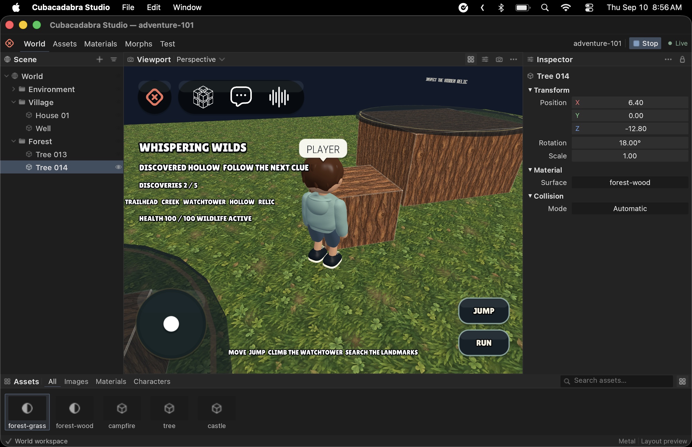 Cubacadabra Studio world workspace showing a forest scene with a player and tree asset selected